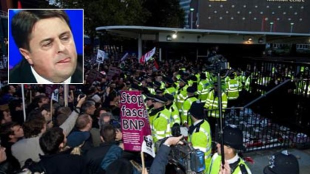 Protesters confront police outside the BBC's London headquarters and, inset, far-right politican Nick Griffin.