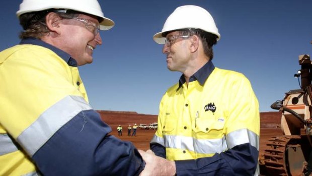 In popular demand: Andrew Forrest (left), recently recruited by Tony Abbott (right) to review indigenous employment programs. Mr Forrest has previously worked on similar projects with Kevin Rudd.