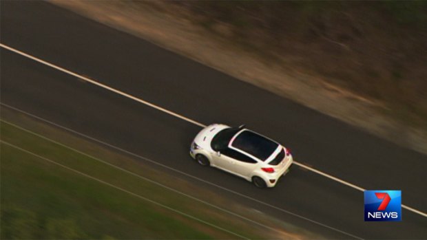The white Hyundai leading police on a chase through Beenleigh, south of Brisbane.