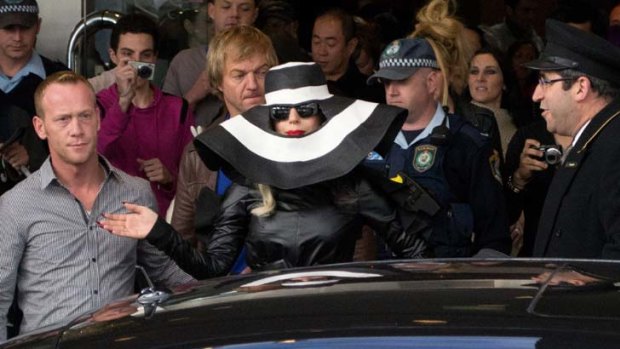On her way ... Lady Gaga is seen departing the Four Seasons Hotel yesterday.