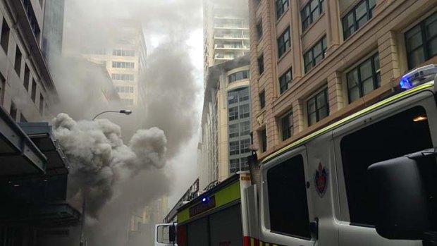 A fire in a pizza oven on the ground floor of an office block forced the evacuation of more than 1200 people.