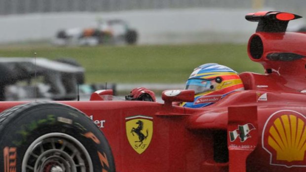 Contender ... Ferrari's Fernando Alonso says he still has a chance. "The title is not gone because mathematically it is still alive," he says.