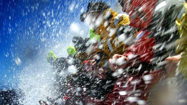 Copping a spray ...  Lahana's crew is blasted with bullets of ice cold spray after punching through an ocean swell near Tasman Island in the final stages of the 2009  race.