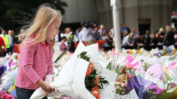 Young hearts: children are exposed to death and grief through family and school but they are also affected by public tragedies such as the Lindt cafe siege and deaths. 