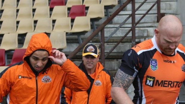 On the way out: Mick Potter (centre) may be finished at the Tigers as early as today.