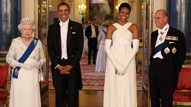 Queen Elizabeth II, US President Barack Obama, his wife Michelle Obama and Prince Philip, Duke of Edinburgh pose in the Music Room of Buckingham Palace.