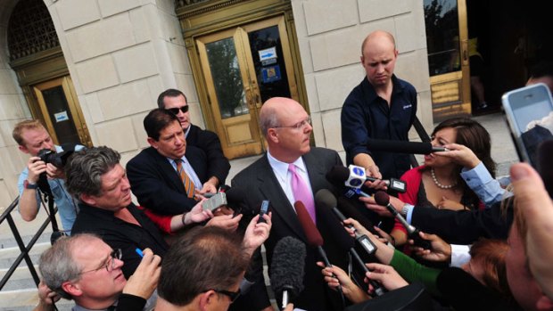 Frenzy ... Attorney Scott C. Cox, representing Paul Peters, addresses the media outside the District Court in Louisville, Kentucky.