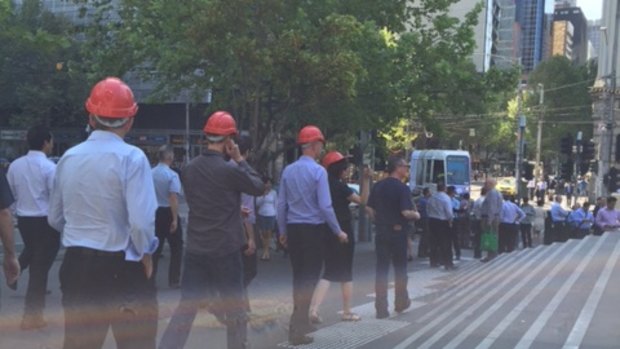 Melbourne office workers take part in an evacuation drill.