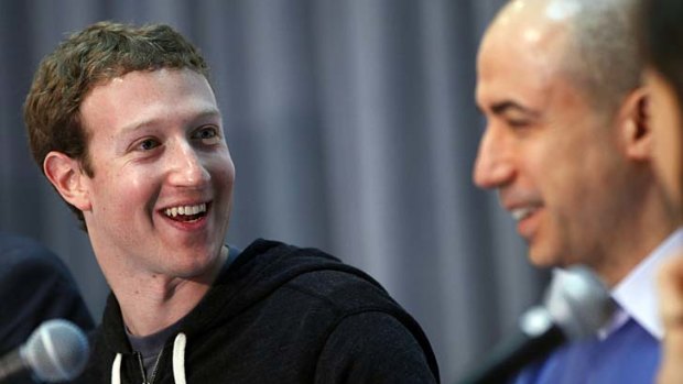 "The winners are going to pick the winners going forward" ... Facebook CEO Mark Zuckerberg, left, with Russian entrepreneur Yuri Milne.