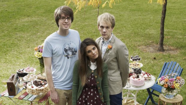 Josh (Josh Thomas, right), his boyfriend Geoffrey (Wade Briggs) and his ex-girlfriend Claire (Caitlin Stasey ) sidestep sitcom cliche in <i>Please Like Me</i>.