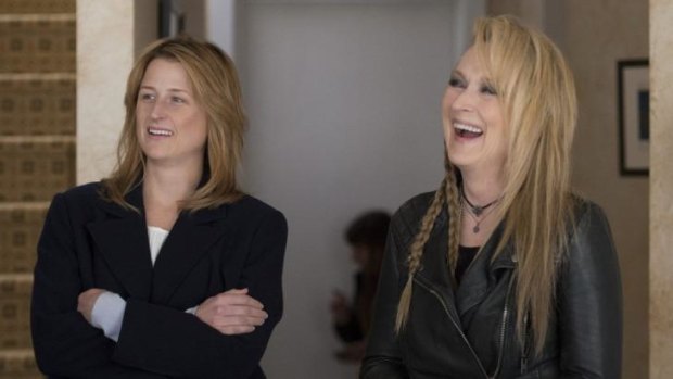 Mamie Gummer, left, plays a woman whose life is crumbling beside real-life mother Meryl Streep in <i>Ricki and the Flash</i>.