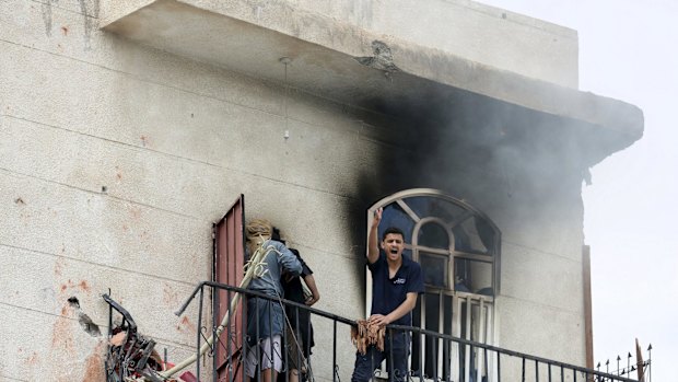 A man reacts at the site of an air strike in Sanaa this week.