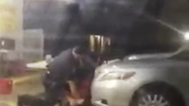  Alton Sterling is detained by two Baton Rouge police officers outside a convenience store. Moments later, one of the officers shot and killed Sterling.