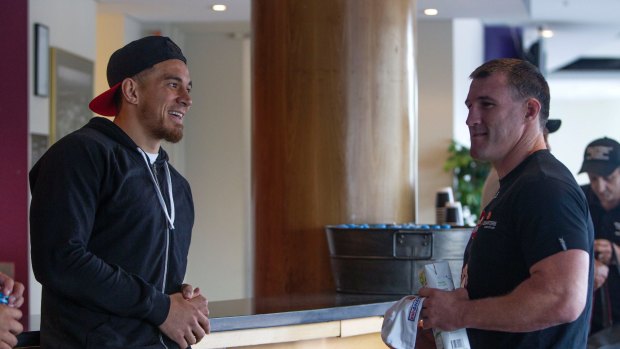 Friendly banter: Sonny Bill Williams and Paul Gallen cross paths at Acer Arena in 2015.