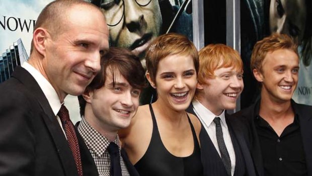 Tom Felton (far right) with his Harry Potter co-stars. Run! There's Voldemort!