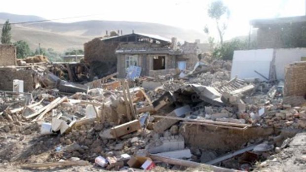 Destruction: Houses reduced to rubble in the town of Bushehr, which is home to Iran's only nuclear reactor, after the earthquake that killed 37 people and injured hundreds.