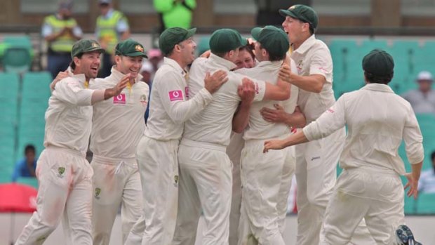 We did it &#8230; the Australians celebrate the final wicket, the fifth in the innings for recalled paceman Ben Hilfenhaus, and an unbeatable 2-0 lead in the four-match Test series with India at the SCG yesterday.
