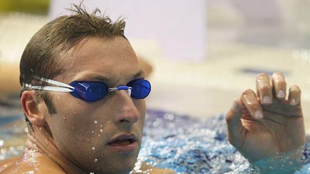 Ian Thorpe trains in the warm-up area on day three of the Australian Swimming Championships in Adelaide yesterday.