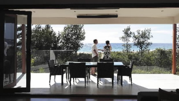 All at sea ... Ian and Sharon Cowley in their Mollymook home. Shoalhaven Council says hundreds of homes inside the predicted 2025 sea level line will be defined as ''high risk''.