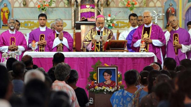 Priests and parishioners perform a funeral service for late nurse Jacintha Saldanha at The Shirve Church near Mangalore.