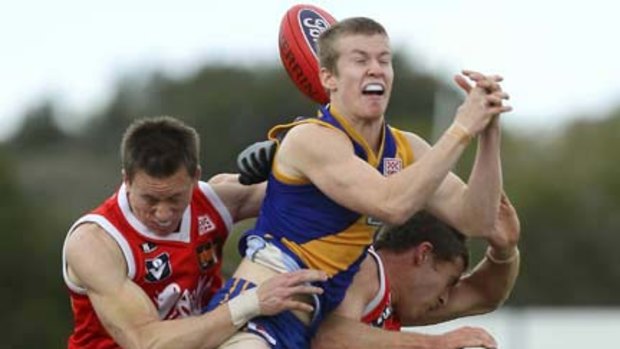 Williamstown's Matthew Little spills a mark in his side's upset loss.