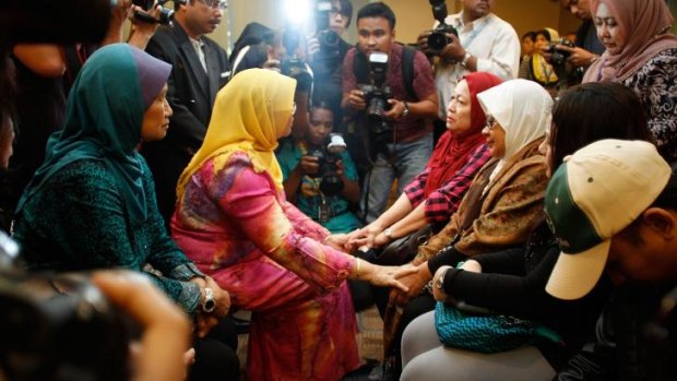 Family members of MH17 passengers meet Malaysian Minister of Women, Family and Community Development Rohani Abdul Karim.