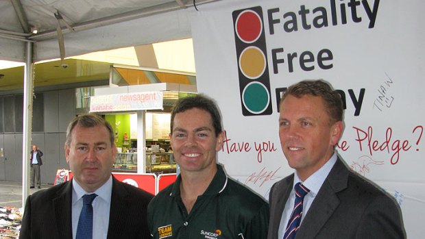 Police Minister Jack Dempsey, V8 Supercar driver Craig Lowndes and Transport Minister Scott Emerson.