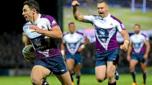 Billy Slater of Melbourne Storm breaks through to score the opening try.