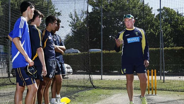 Craig McDermott coaches youngsters in Canberra last month.
