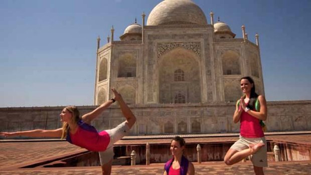 Australian synchronised swimmers, Eloise Amberger, Sarah Bombell and Tarren Otte pose at the Taj Mahal.