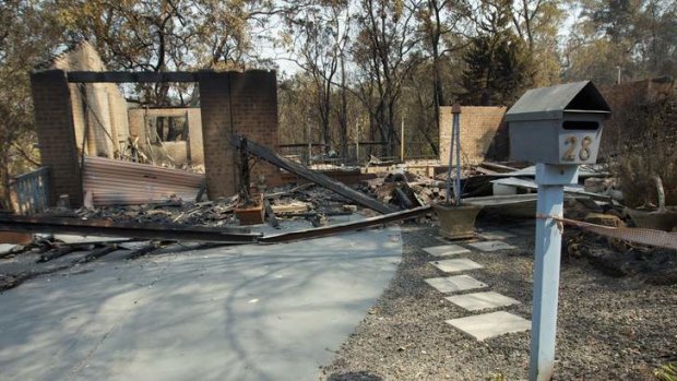 Post-fire blues: Costly regulations cover rebuilding.