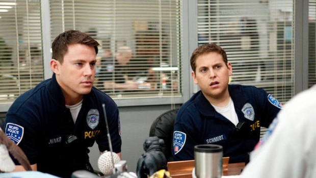 Channing Tatum (left) and Jonah Hill make an arresting pair as police rookies who return to high school in the film version of <i>21 Jump Street</i>.