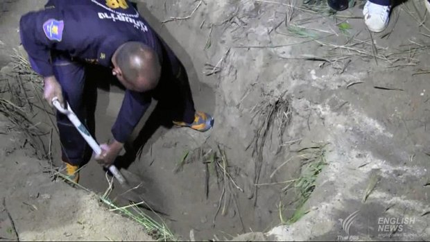 Wayne Schneider's body was found in a two-metre-deep grave in roadside bushes near a Chinese temple.