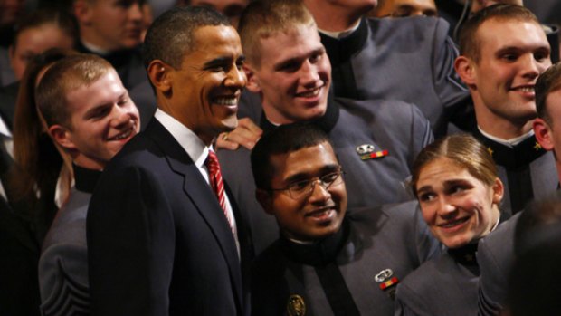 President Barack Obama poses for a picture with cadets at West Point.