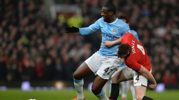 Snub: Yaya Toure in action against Manchester United in March.