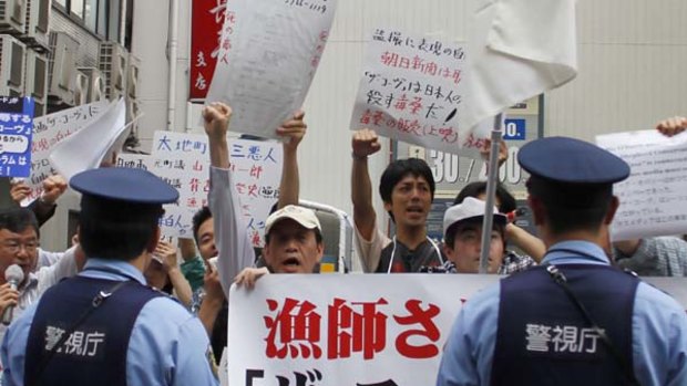 No show ... Japanese whaling supporters protest against a screening of the film The Cove in Tokyo.