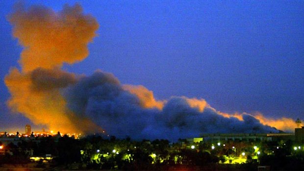 Smoke rises in the early hours of the morning, Baghdad, Iraq 2003.