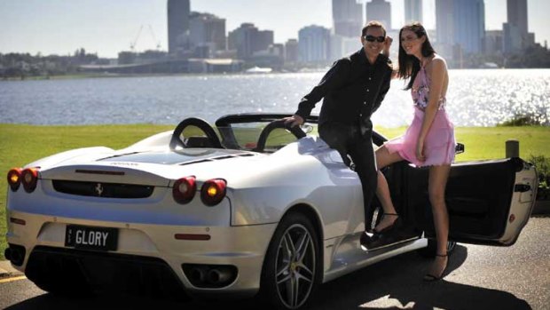Tony Sage with another of his cars - a Ferrari that he auctioned earlier this year to raise money for Perth Glory.
