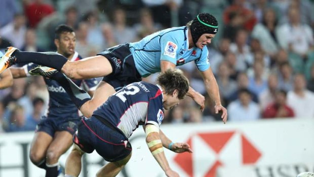 Collision ... James O'Connor comes off worse after Berrick Barnes crashes into him last month.