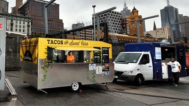 The mobile food vans. Gumbo Kitchen (right) will not receive a new permit.