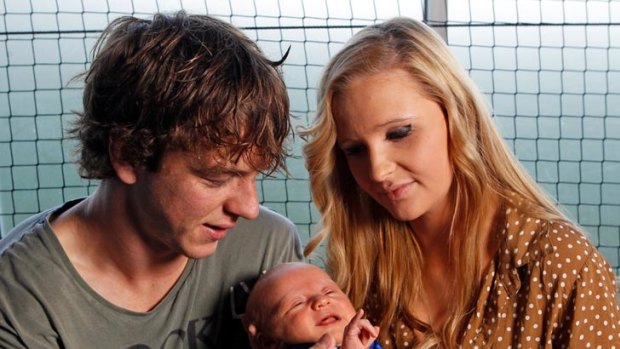 Liam Picken with his partner Annie and their four-week-old son, Malachy.