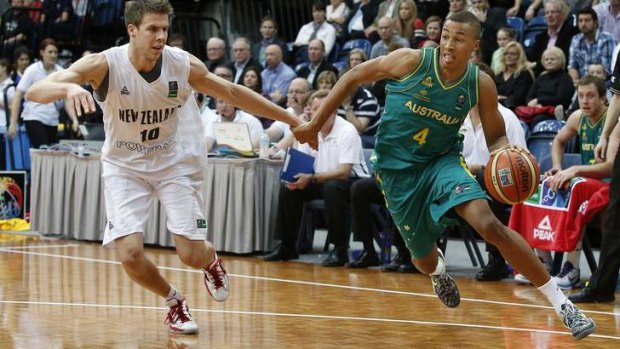Dante Exum playing for the Boomers against New Zealand at the AIS Arena in 2013.