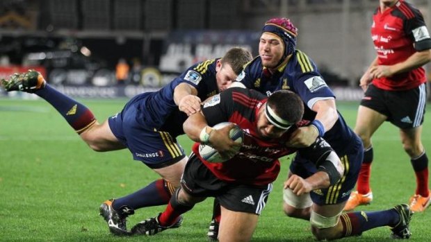 Nepo Laulala of the Crusaders dives over to score a try during the round 15 Super Rugby match between the Highlanders and the Crusaders at Forsyth Barr Stadium in Dunedin.