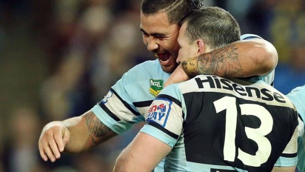 Seventh heaven: Andrew Fifita and Paul Gallen celebrate after winning last year's controversial elimination final.
