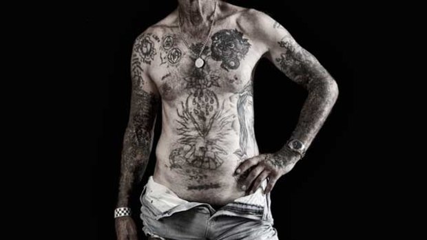 Tjepkema shows various tattoos from different stages of his life.