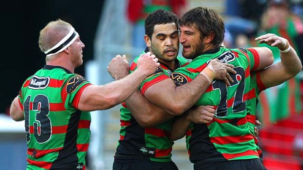 David Taylor of the Rabbitohs celebrates after scoring a try against the Storm.