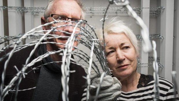 Artists Denise Higgins and Gary Smith working on the barbed maze installation, to show at Canberra Contemporary Art Space (CCAS) Gallery later this year. 