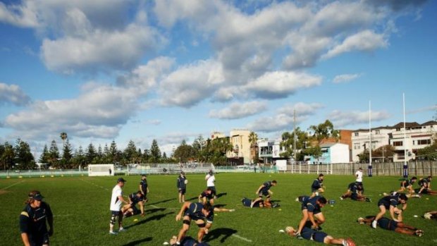 The Wallabies complete a training drill at Coogee Oval in preparation for Saturday's Test against France.