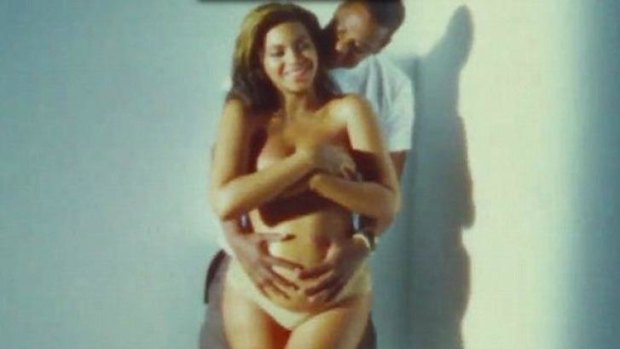A heavily pregnant Beyonce with the couple's first child, Blue Ivy.