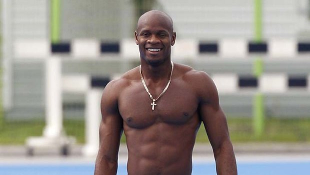 Asafa Powell of Jamaica smiles during a training session in Daegu on Wednesday.
